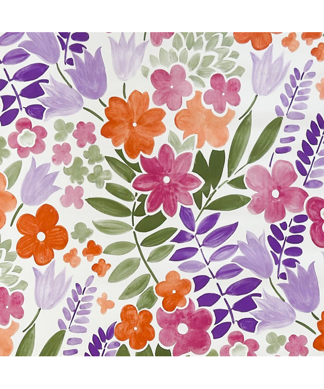 Florale Wachstuch-Tischdecke mit pinken, orangen und violetten Blüten sowie grünen Blättern auf hellem Hintergrund, dichtes und verspieltes Muster für fröhliche und farbenfrohe Tischdekoration