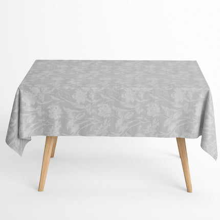 Beschichtete Baumwoll-Tischdecke mit Fleckenschutz im Design CARDUCHO, hellgrauer Hintergrund mit einem dezenten Ton-in-Ton-Allover-Muster aus filigranen Wiesenblumen, Gräsern und Blättern in Weiß.