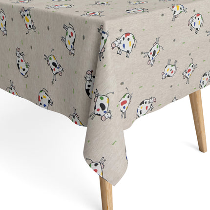 Jacquard-Tischdecke aus beschichteter Baumwolle in Natur mit buntem Kuhmotiv, fleckenabweisend.