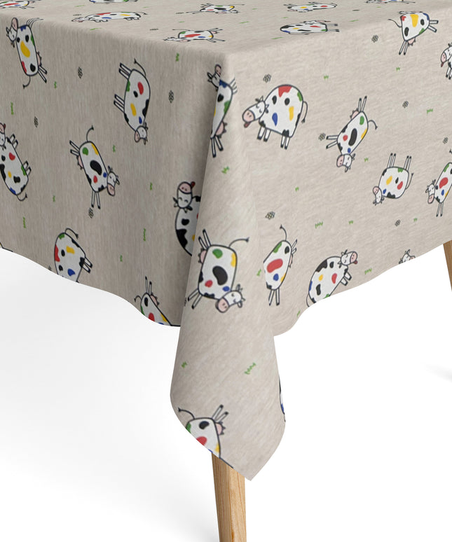 Jacquard-Tischdecke aus beschichteter Baumwolle in Natur mit buntem Kuhmotiv, fleckenabweisend.