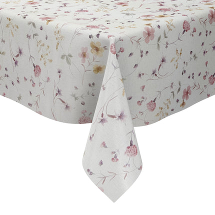 Rechteckige Wachstuch-Tischdecke mit zartem Streublumenmuster in Rosa, Flieder und Gelb auf cremeweißem Hintergrund. Filigrane Blüten, feine Zweige und kleine Blätter verleihen der Tischdecke eine romantische, leichte Ausstrahlung im Landhausstil.