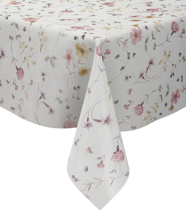 Rechteckige Wachstuch-Tischdecke mit zartem Streublumenmuster in Rosa, Flieder und Gelb auf cremeweißem Hintergrund. Filigrane Blüten, feine Zweige und kleine Blätter verleihen der Tischdecke eine romantische, leichte Ausstrahlung im Landhausstil.