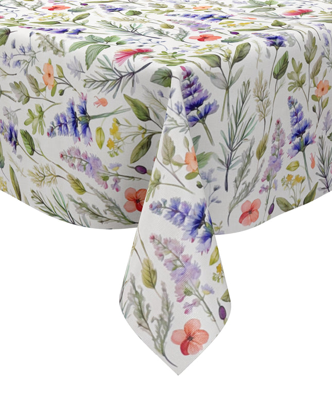 Wachstuch-Tischdecke mit filigranem Wildblumenmuster auf hellem Hintergrund. Zarte Blüten in Rosa, Lila, Blau, Gelb und Koralle werden von feinen grünen Blättern und Gräsern im Aquarellstil ergänzt.