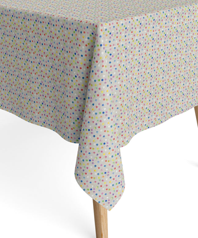 Jacquard-Tischdecke aus beschichteter Baumwolle mit hellem Grund und feinem, buntem Punktmuster in Blau, Rosa, Rot, Gelb, Grün, Orange und Violett.