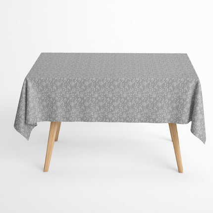 Jacquard-Tischdecke aus beschichteter Baumwolle in Grau mit feinem weißen Streublümchenmuster, fleckenabweisend.